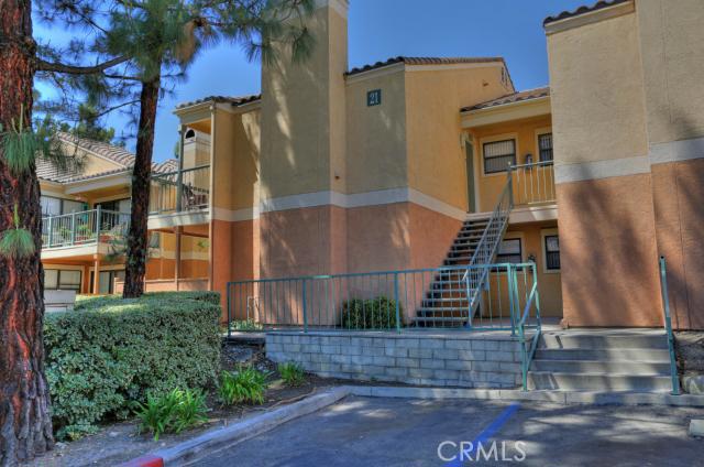 10655 Lemon Avenue, Unit 2106 Rancho Cucamonga, CA 91737 - Photo 1 of 1 a view of a brick building with many windows
