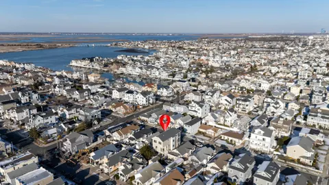 an aerial view of beach and ocean