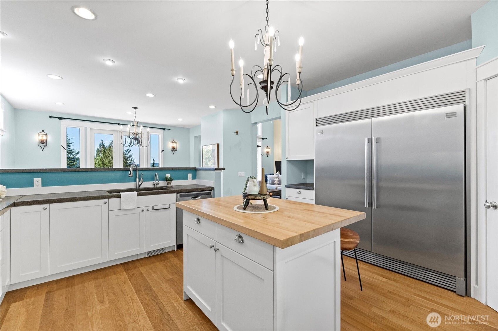 89 Grand View Lane Bellingham, WA 98229 - Photo 12 of 40 a kitchen with a sink refrigerator and microwave