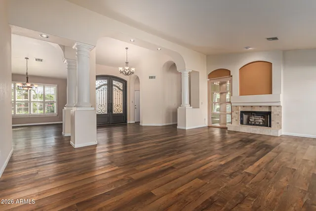 a kitchen with stainless steel appliances granite countertop a stove and a microwave