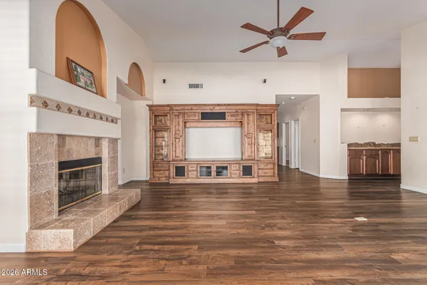 a kitchen with stainless steel appliances granite countertop a stove and a microwave