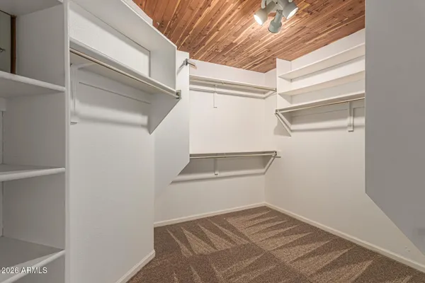 a kitchen with a refrigerator sink and stove