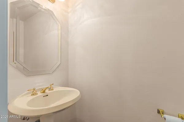 a view of a house with a yard and plant