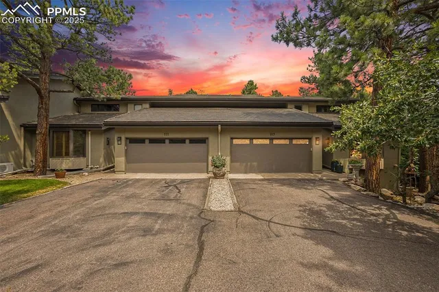 front view of a house with a garage