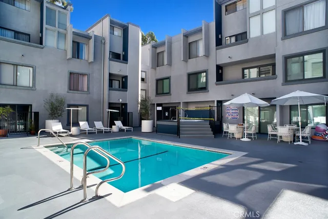 a view of a building with sitting area