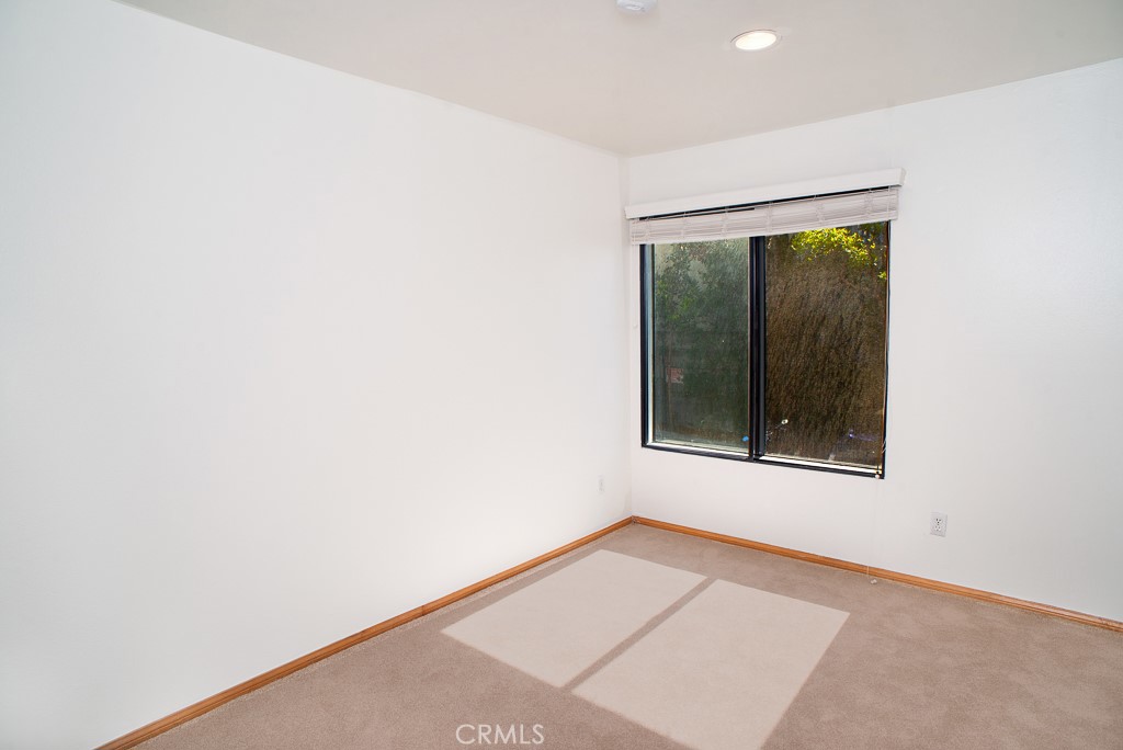 1940 Highland Avenue, Unit 10 Los Angeles, CA 90068 - Photo 13 of 22 a view of an empty room with a window