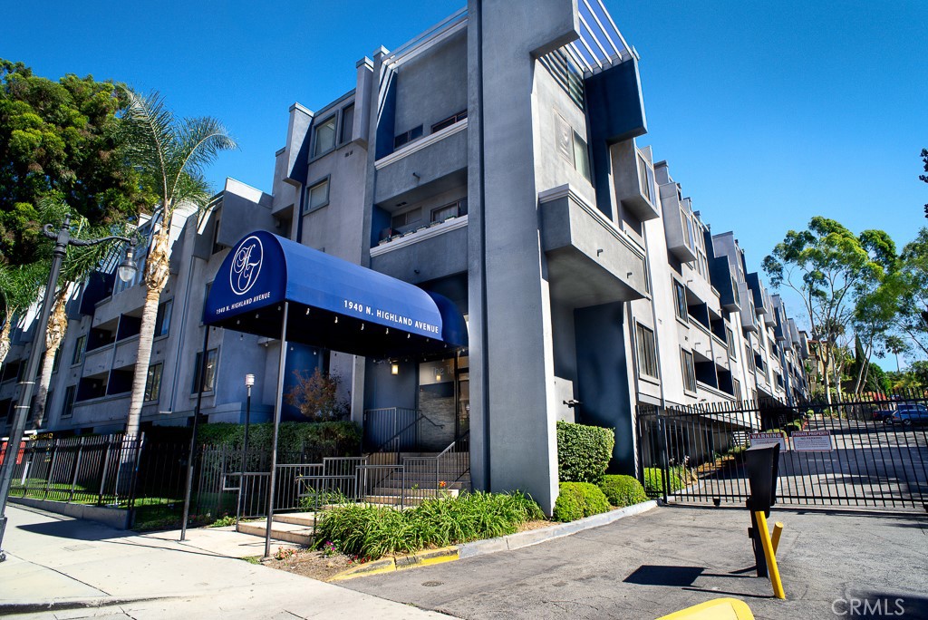 1940 Highland Avenue, Unit 10 Los Angeles, CA 90068 - Photo 2 of 22 a street sign on a street corner