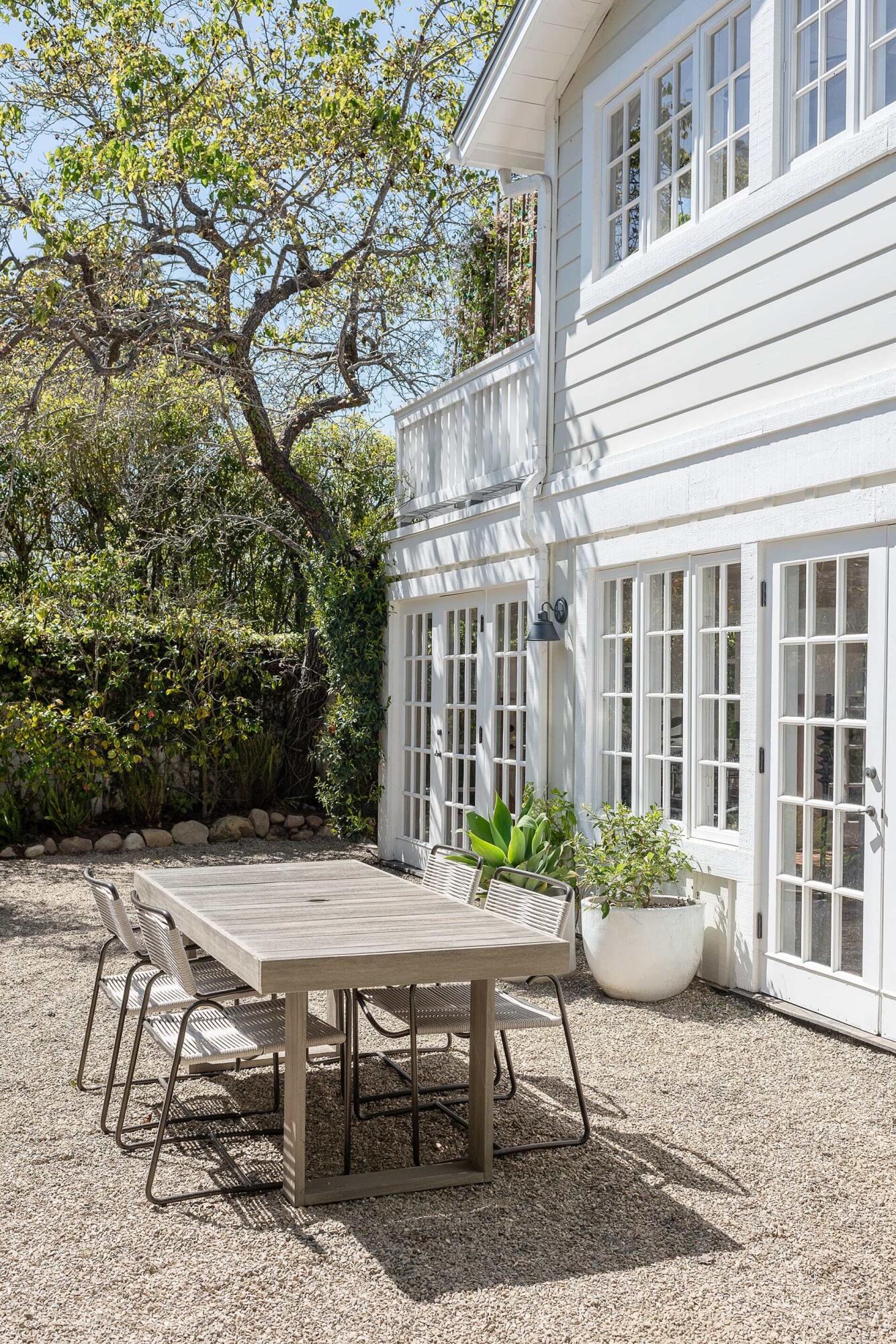 1355 Danielson Road Montecito, CA 93108 - Photo 12 of 25 a view of a patio with table and chairs and potted plants
