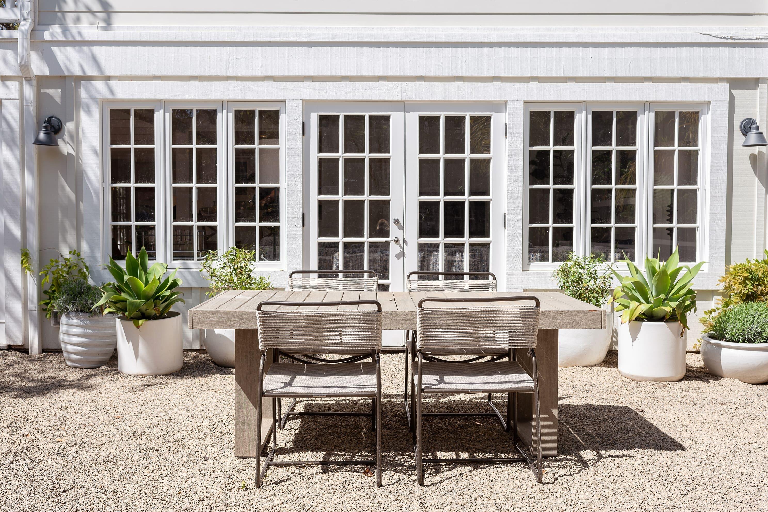 1355 Danielson Road Montecito, CA 93108 - Photo 25 of 25 a patio with a table and chairs and potted plants