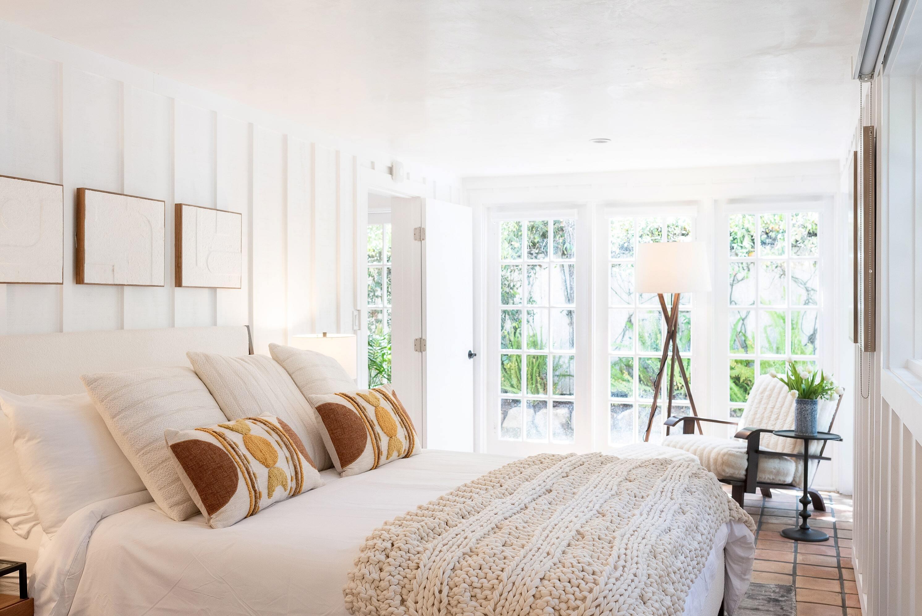 1355 Danielson Road Montecito, CA 93108 - Photo 9 of 25 a bedroom with furniture and large windows