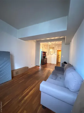 a white refrigerator freezer sitting inside of a kitchen