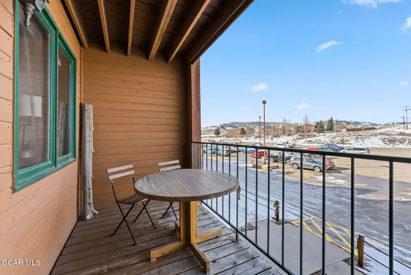 a view of a balcony with city view