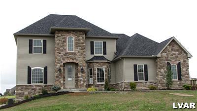 212 East Dell Road Bath, PA 18014 - Photo 2 of 24 a front view of a house with a yard