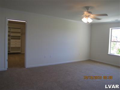 212 East Dell Road Bath, PA 18014 - Photo 9 of 24 an empty room with windows and chandelier fan