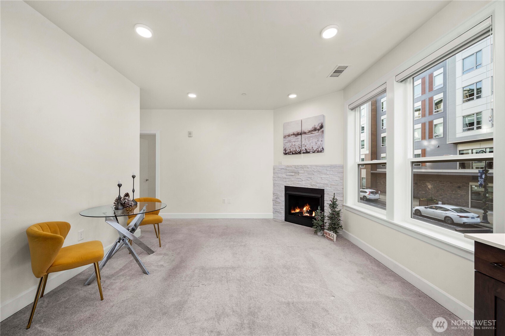 4961 Main Street, Unit 314 Tacoma, WA 98407 - Photo 11 of 40 a view of a livingroom with furniture and a fireplace