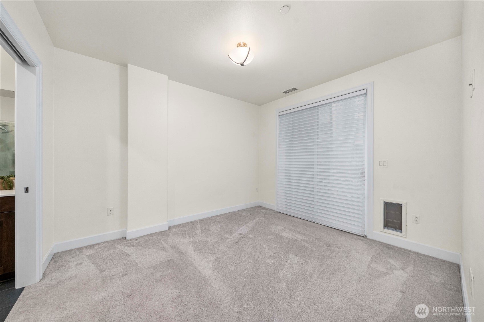 4961 Main Street, Unit 314 Tacoma, WA 98407 - Photo 20 of 40 a view of an empty room with a window