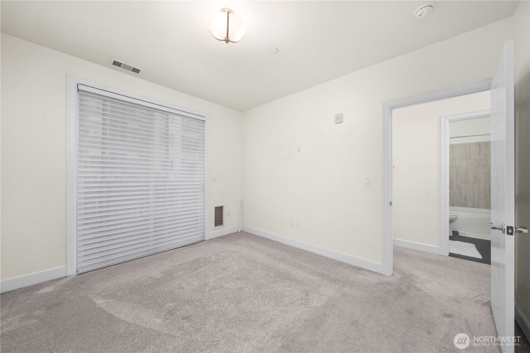 4961 Main Street, Unit 314 Tacoma, WA 98407 - Photo 21 of 40 an empty room with a empty space
