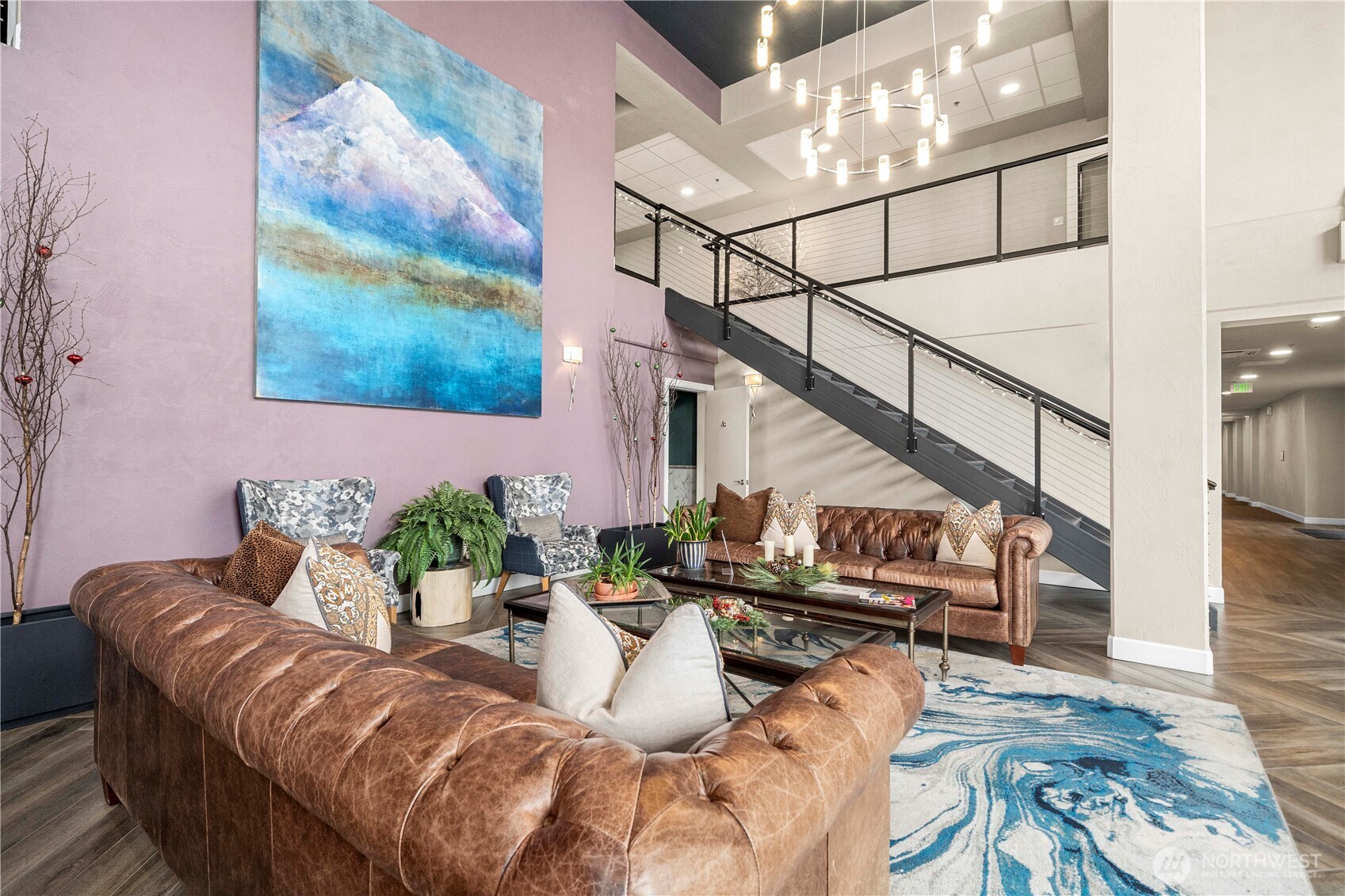 4961 Main Street, Unit 314 Tacoma, WA 98407 - Photo 31 of 40 a view of entryway livingroom and hall with wooden floor