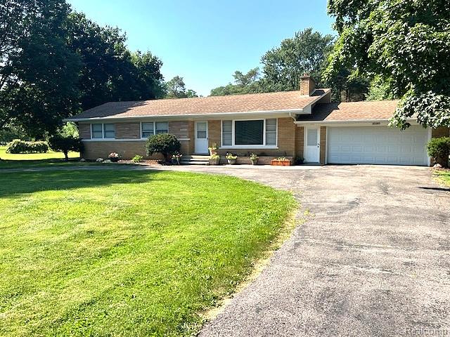 20285 29 Mile Road Ray, MI 48096 - Photo 2 of 25 Ranch-style residence featuring a brick facade and a two-car garage