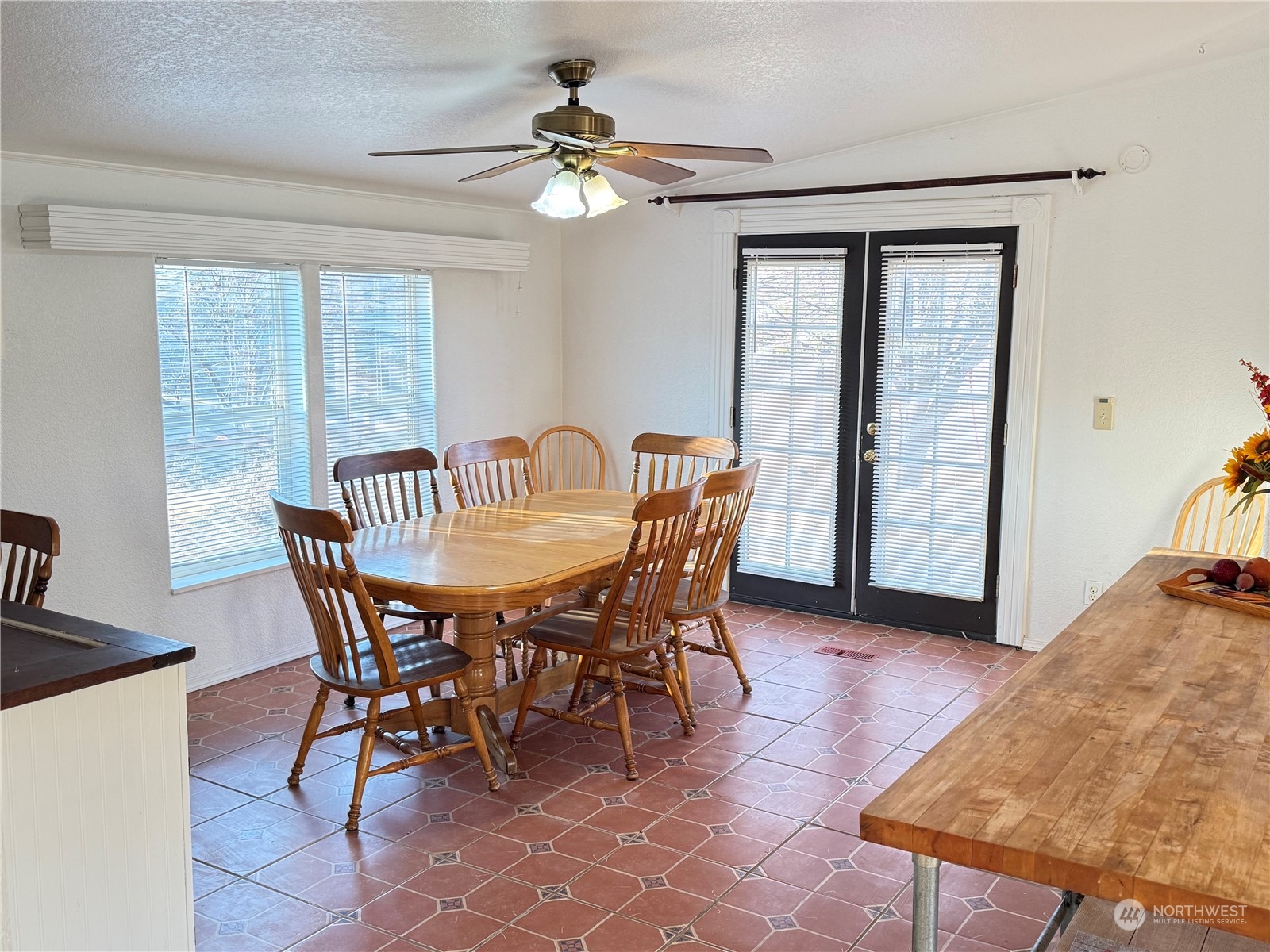 402 Poulsen Road Dayton, WA 99328 - Photo 9 of 34 a view of a dining room with furniture and chandelier
