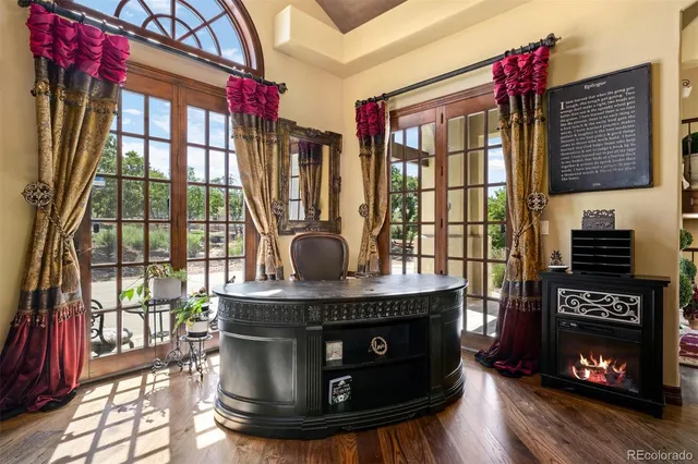 a kitchen with a stove and a window