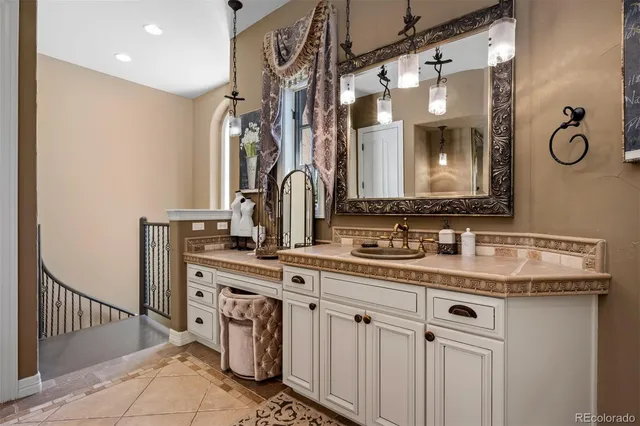 a bathroom with a sink double vanity and a mirror