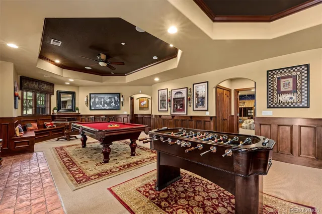 a living room with furniture and a rug