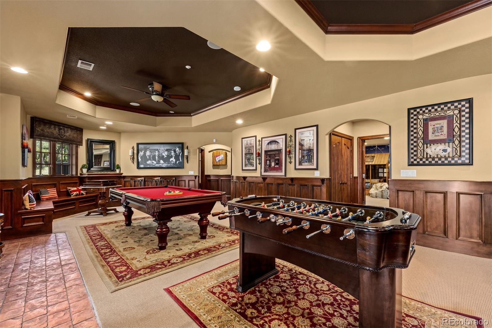 3440 Medallion Road Castle Rock, CO 80104 - Photo 39 of 50 a living room with furniture and a rug