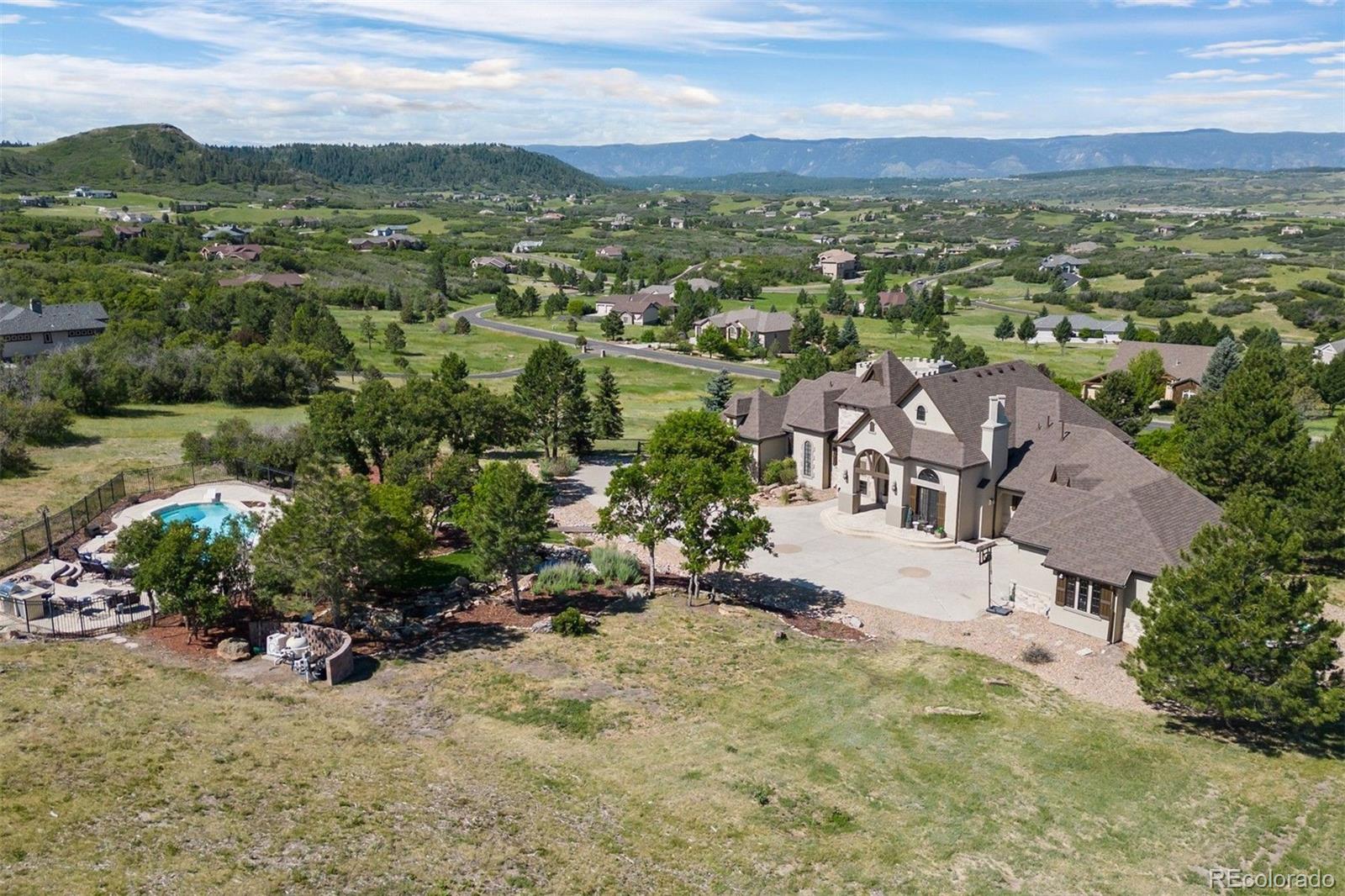 3440 Medallion Road Castle Rock, CO 80104 - Photo 49 of 50 an aerial view of residential houses with outdoor space and trees