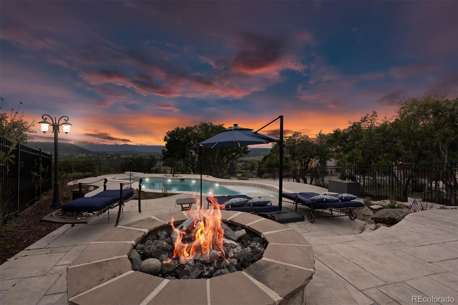 3440 Medallion Road Castle Rock, CO 80104 - Photo 5 of 50 a view of a backyard with sitting area