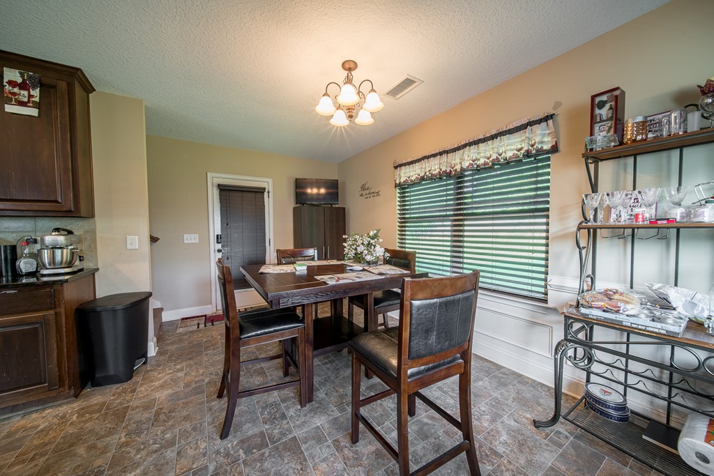 18 Summershade Court Fort Mitchell, AL 36856 - Photo 17 of 37 a view of a dining room with furniture