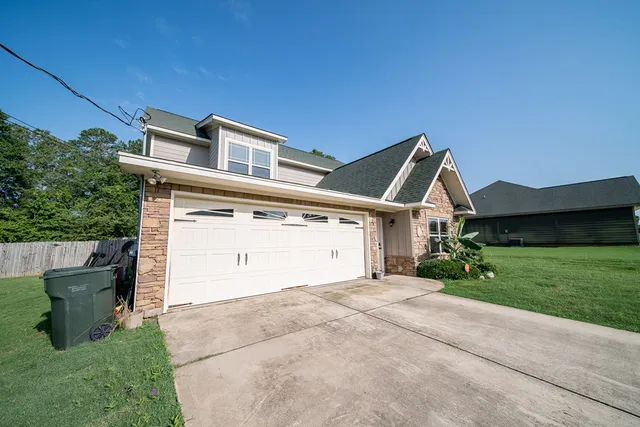 front view of a house with a street
