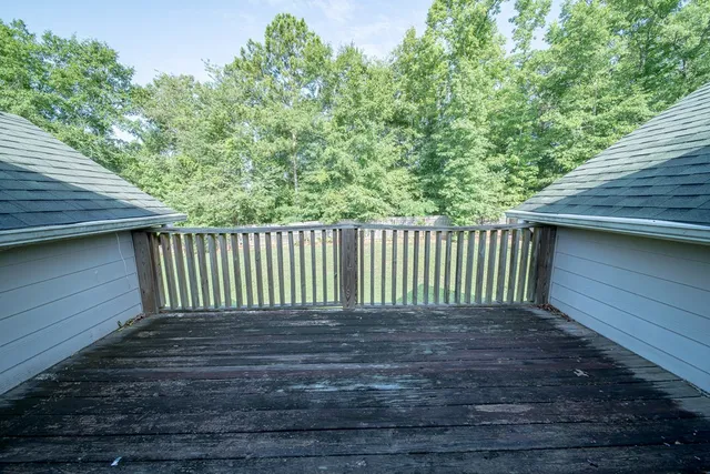 a view of a wooden fence
