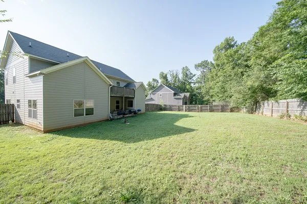 a view of a backyard with a garden