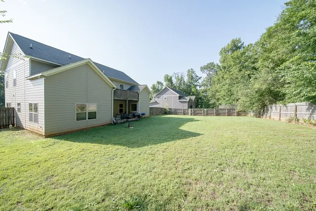 a view of a backyard with a garden