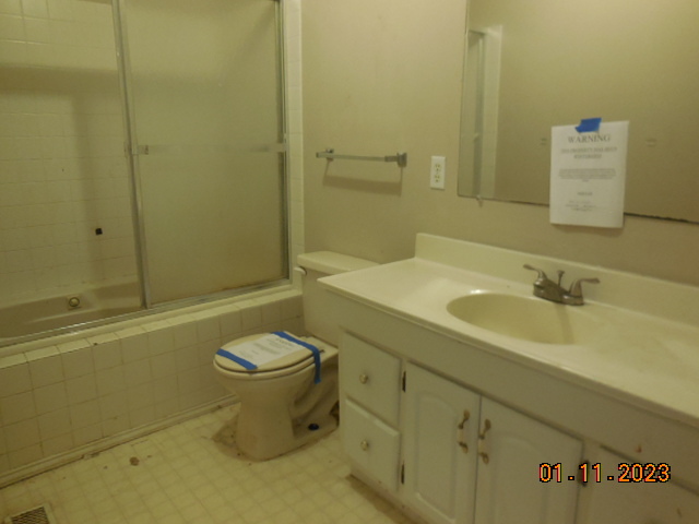 2008 Ridge Creek Drive Bloomington, IL 61705 - Photo 13 of 14 a bathroom with a sink toilet and shower