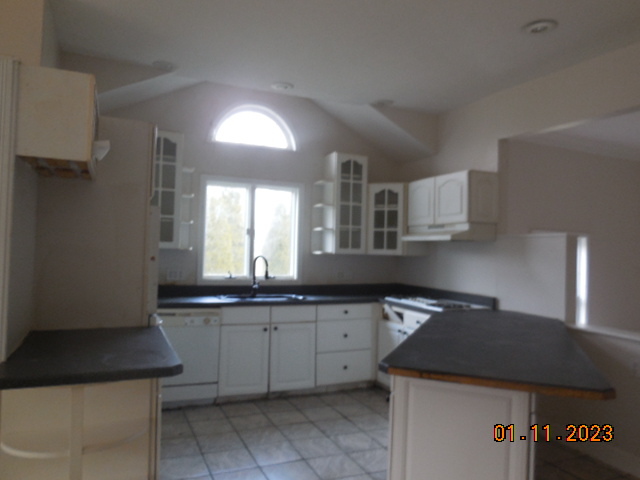 2008 Ridge Creek Drive Bloomington, IL 61705 - Photo 4 of 14 a kitchen with a sink and cabinets
