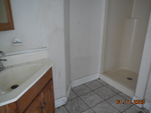 2008 Ridge Creek Drive Bloomington, IL 61705 - Photo 6 of 14 a bathroom with a sink and a shower