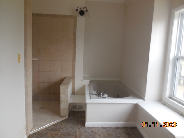 2008 Ridge Creek Drive Bloomington, IL 61705 - Photo 8 of 14 a bathroom with a bathtub