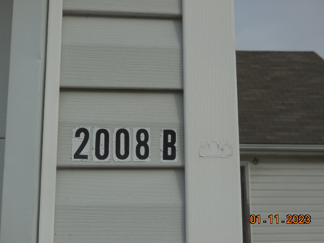 2008 Ridge Creek Drive Bloomington, IL 61705 - Photo 9 of 14 a close up of a street sign