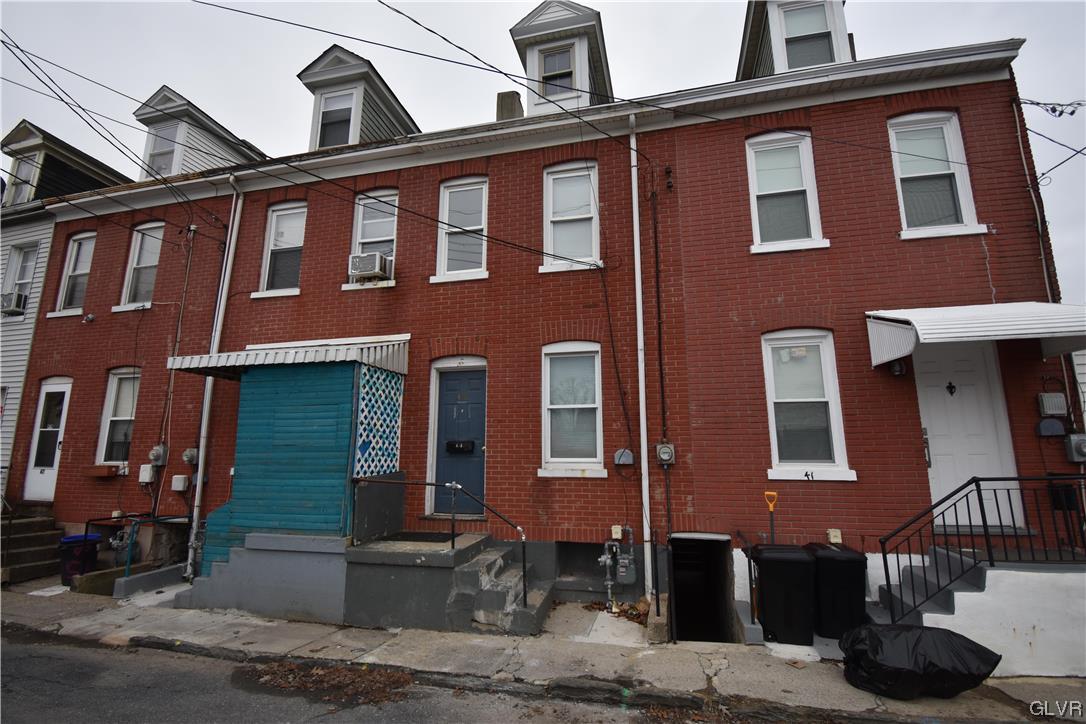 43 South Warren Street Easton, PA 18042 - Photo 2 of 13 a front view of a building with glass windows