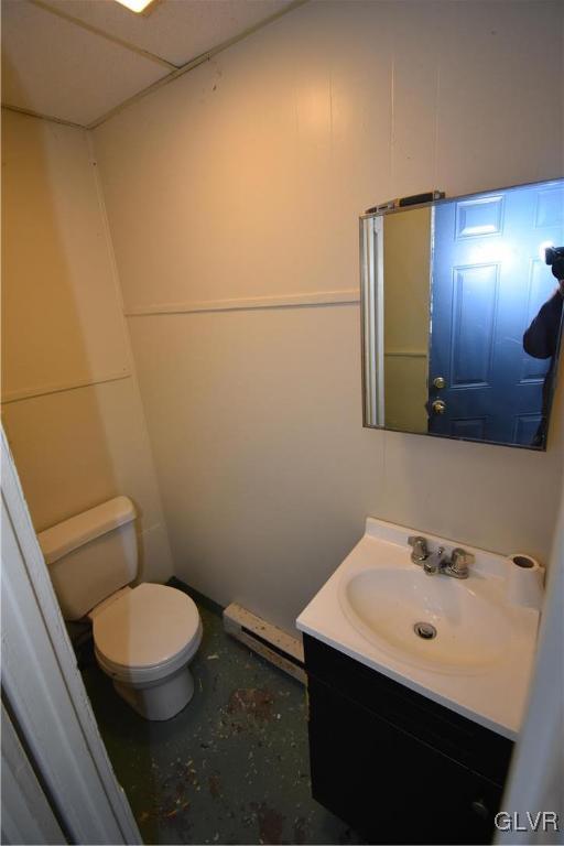 43 South Warren Street Easton, PA 18042 - Photo 4 of 13 a bathroom with a sink a toilet and mirror