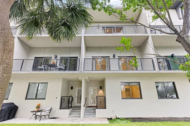 a view of room with white walls and a window