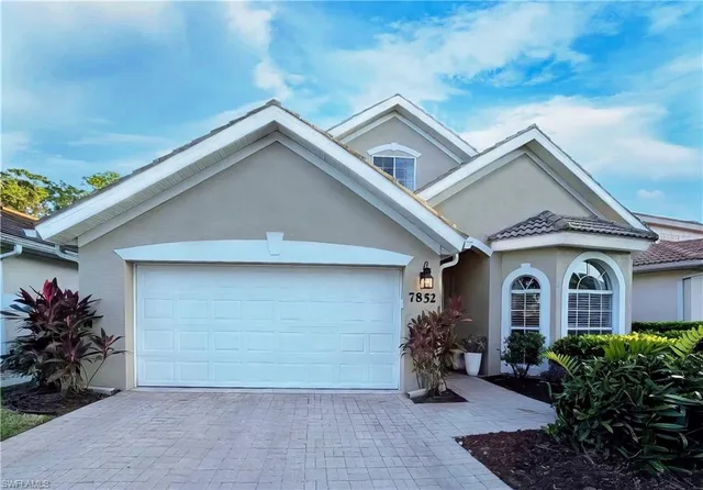 a view of a house with garden