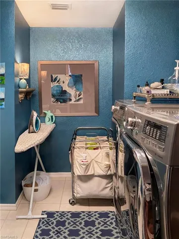 a front view of house with a garden