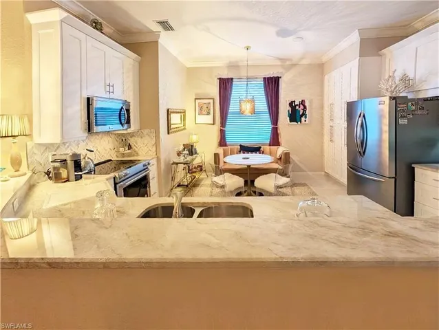 a bathroom with a sink double vanity and mirror