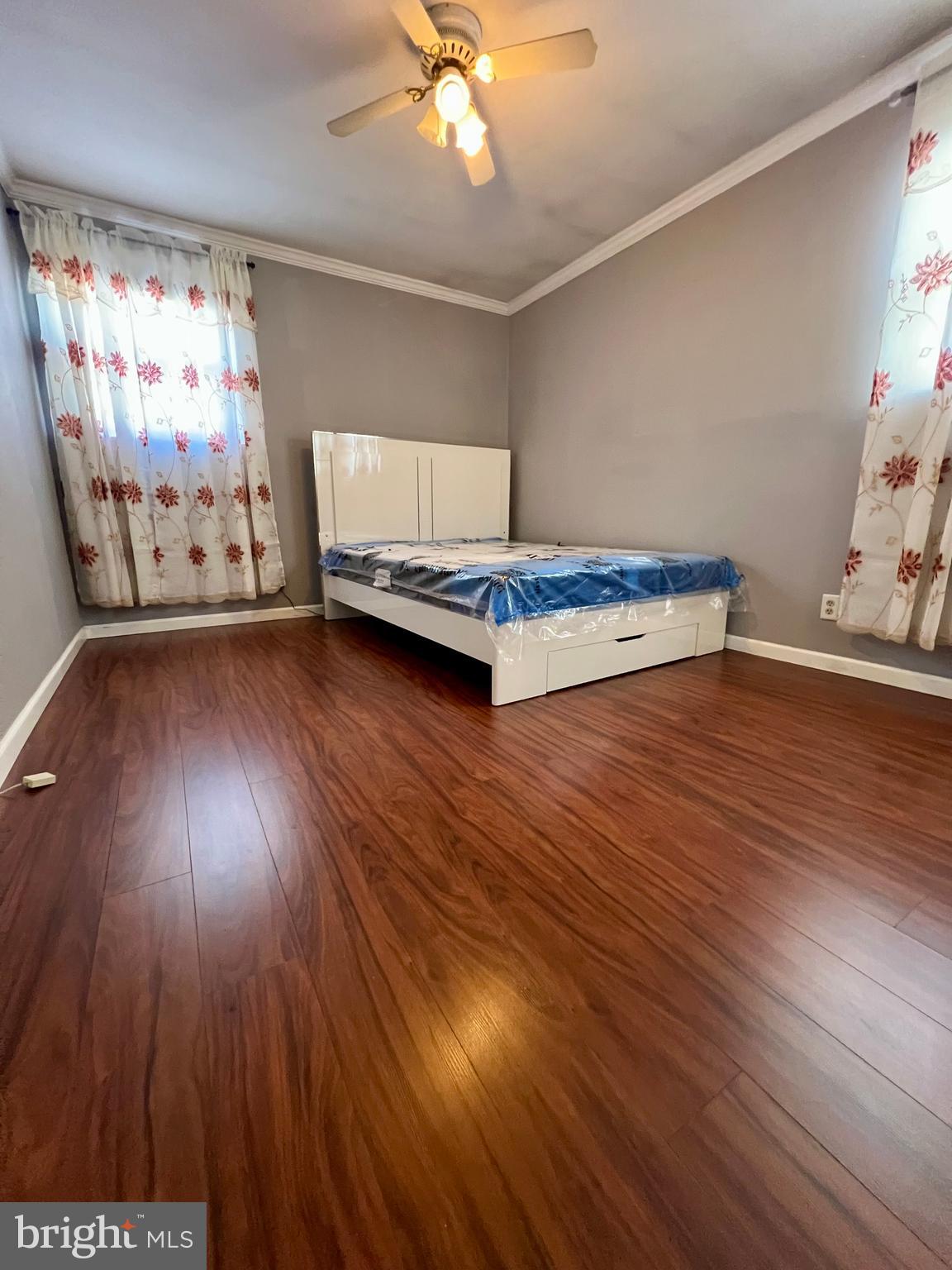 2988 Welsh Road Philadelphia, PA 19152 - Photo 31 of 38 a living room with hardwood floor and a ceiling fan