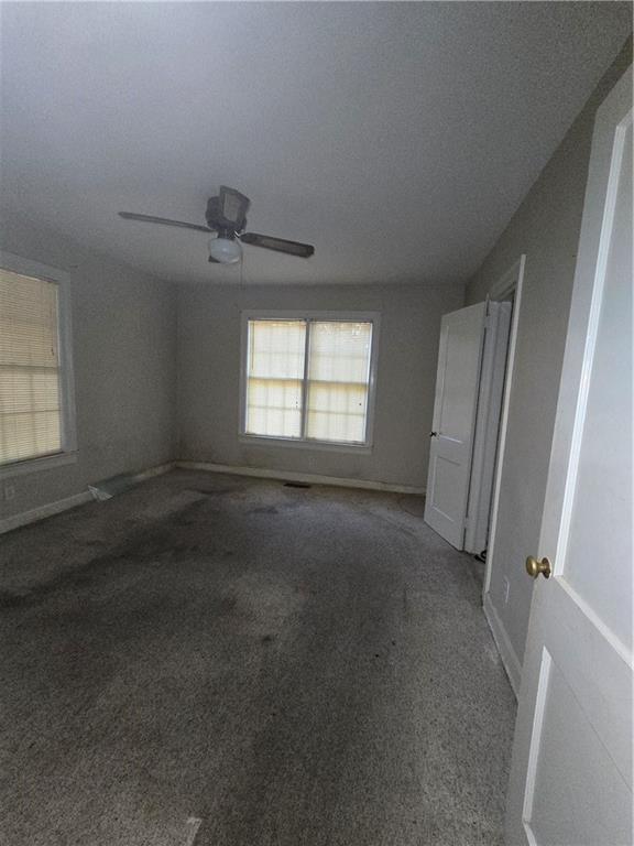 717 8th Avenue Albany, GA 31701 - Photo 15 of 25 an empty room with windows and closet