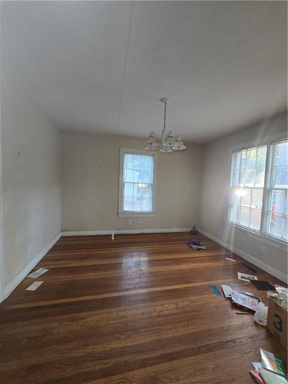 717 8th Avenue Albany, GA 31701 - Photo 10 of 25 a view of empty room with wooden floor and window