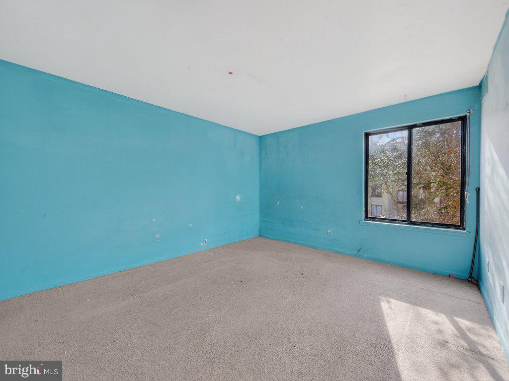 9635 White Acre Road, Unit B2 Columbia, MD 21045 - Photo 19 of 31 a view of a room with a large window